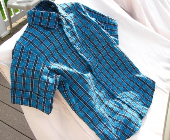 Boys' blue plaid short sleeved shirt.